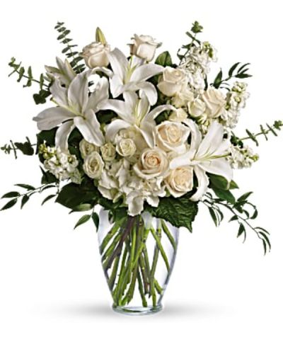 <div id="mark-3" class="m-pdp-tabs-marketing-description">A dreamy bouquet of white sympathy flowers is a comforting reminder of your love. The lush arrangement of soft colors is delivered in a majestic, tall glass vase.</div>
<div id="desc-3">
<ul>
<li>This gorgeous bouquet overflows with white hydrangea, crème roses, white spray roses, white oriental lilies, white stock, spiral eucalyptus, salal and Italian ruscus in a classic glass vase.</li>
</ul>
</div>